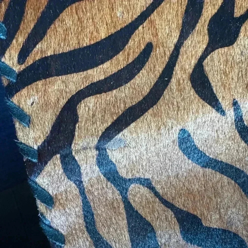 Cow hide tiger strip placemat.  A few areas where hair is gone. See photos. - Picture 7 of 7